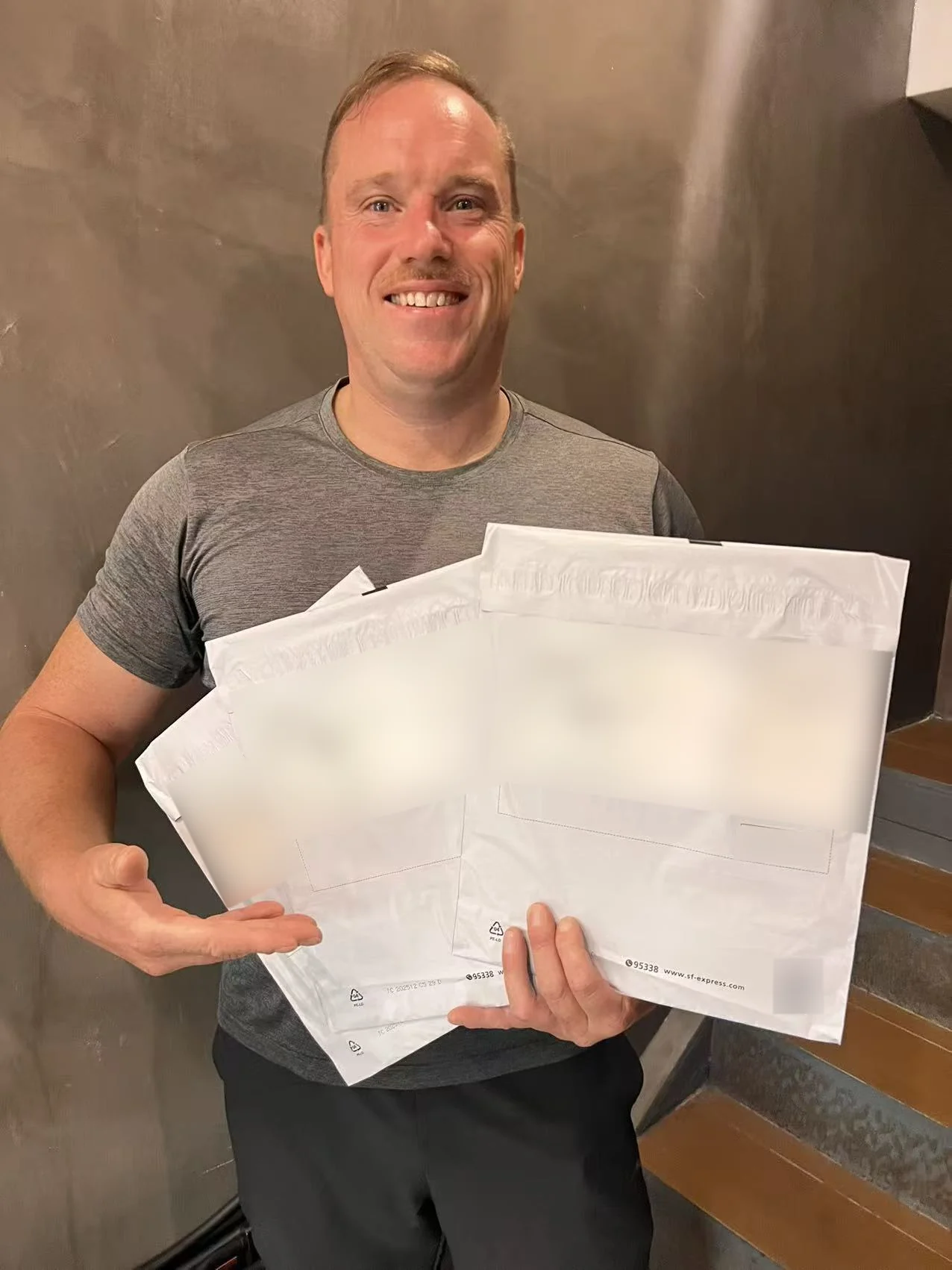 Leon Mead holding copies of the demand letter